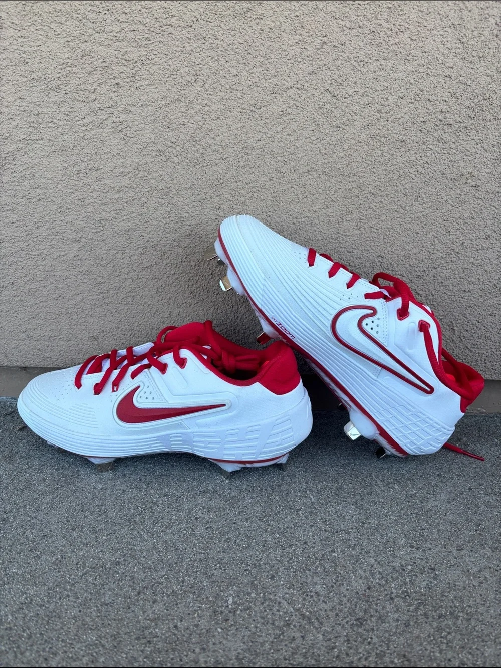 Nike White and Red Softball Cleats with Red Swoosh